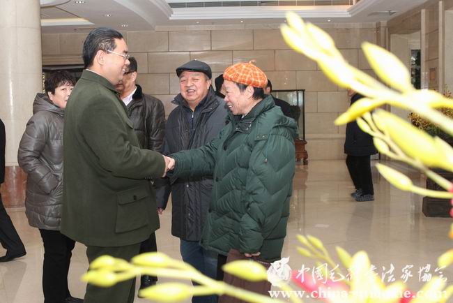 签到现场 中国毛体书法家协会会长景学勤将军与马建武书记,鞠威